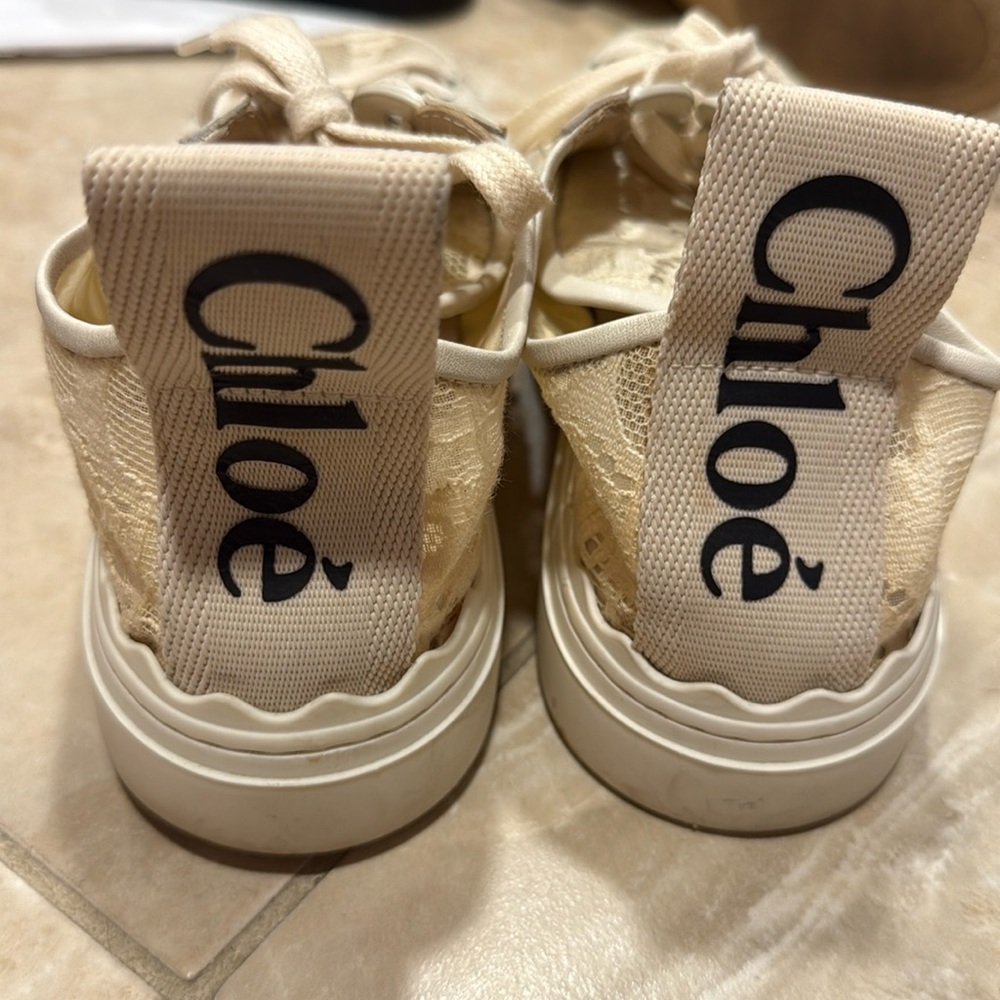Chloe Lace Sneakers
Size 37
In EUC. Retail $650